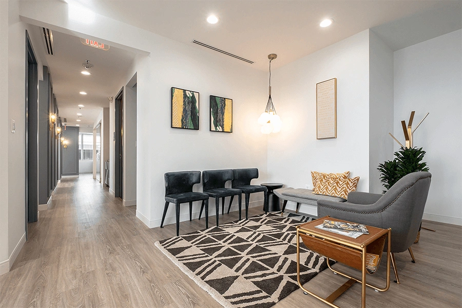 Bright and modern dental office waiting room with patient seating